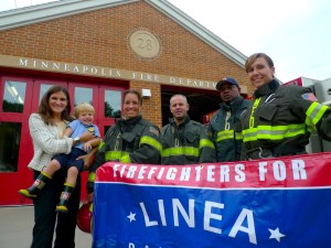 Linea and Charlie with Minneapolis Firefighters